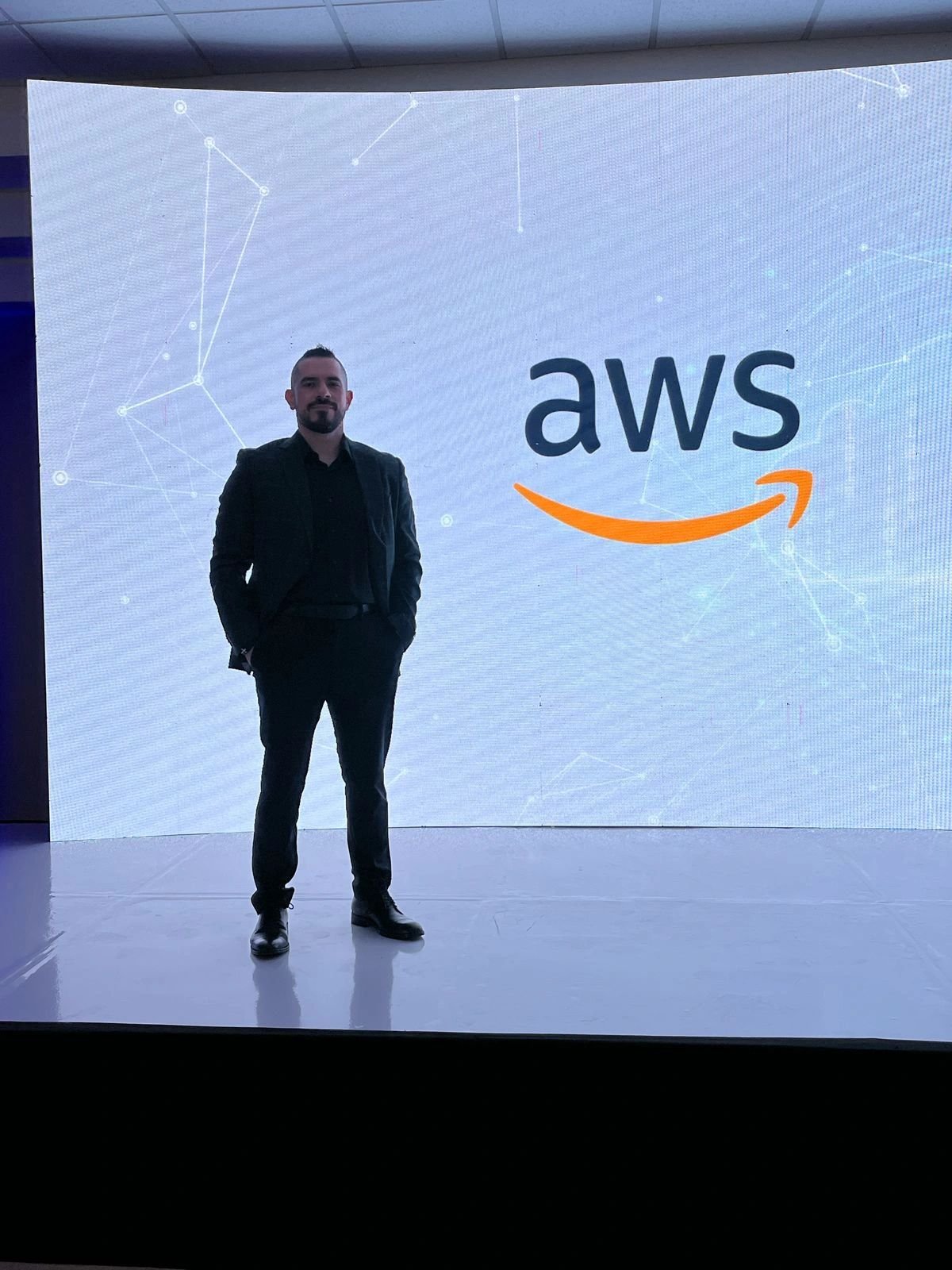 Allan Rodezno speaking at AWS Summit 2025