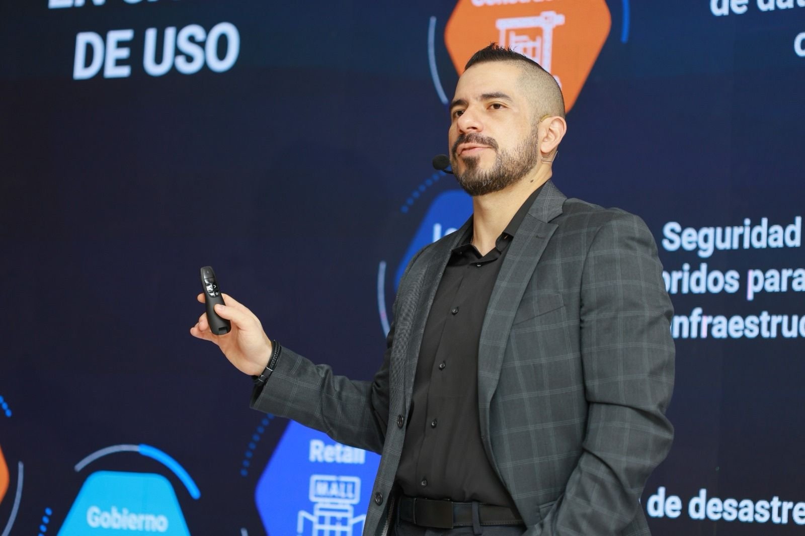Allan Rodezno speaking at AWS Summit 2025
